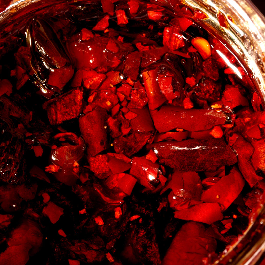 A glass jar of Lao Gan Ma Spicy Chili Crisp.