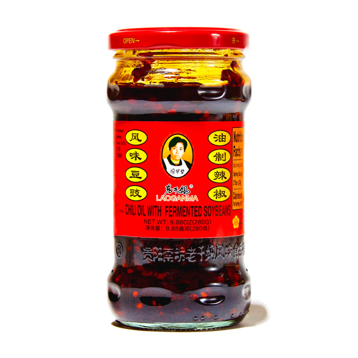 A jar of Lao Gan Ma Chili Oil with Fermented Soybeans on a white background.