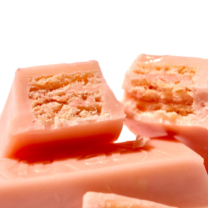 A close up of a Japanese Kit Kat: Strawberry candy bar by Nestle Japan.