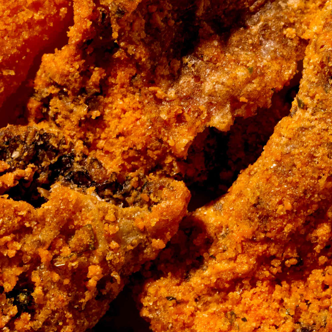A close up of Irvins Salted Egg Salmon Skin.