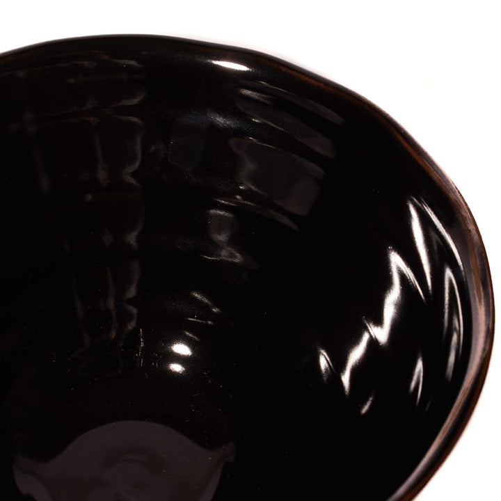 A Black Tenmoku Round Ramen Bowl on a white background, by Korin.