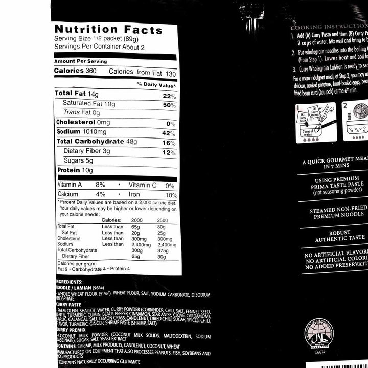 The back of a Prima Taste Singapore Noodles: Wholegrain Curry La Mian nutrition label on a black background.