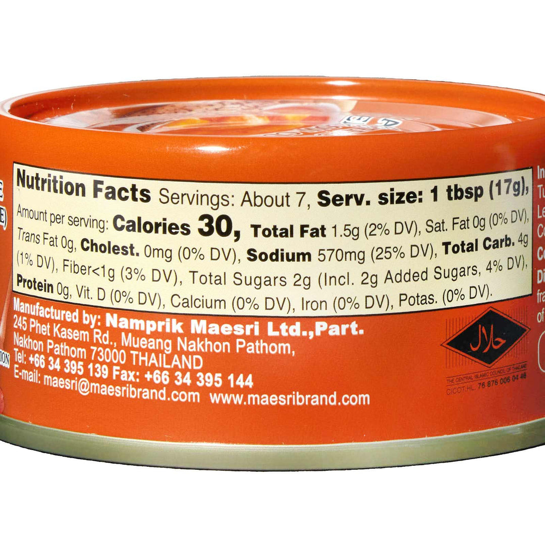 A can of Maesri Thai Yellow Karee Curry Paste with nutritional information on it.