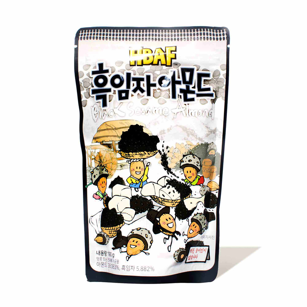 A bag of Tom's Farms Korean Style Almonds: Black Sesame with cartoon characters on it.