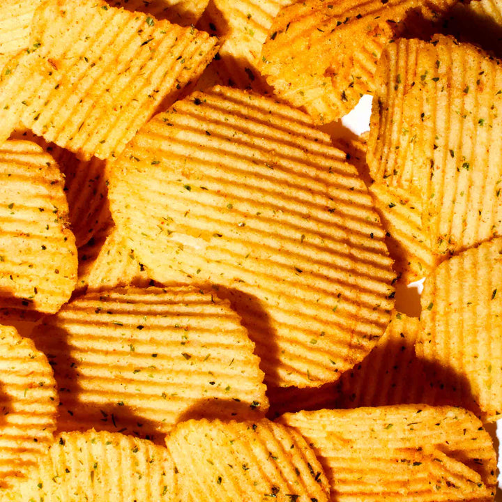A pile of Hwa Yuan Potato Chips: Taiwan Oyster Omelette on a white background.