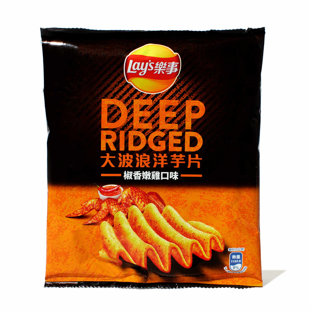 A bag of Lay's Deep Ridged Pepper Chicken potato chips on a white background.