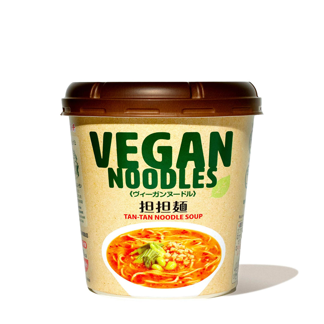 A container of Yamadai Vegan Ramen Noodle: Dan Dan on a white background.
