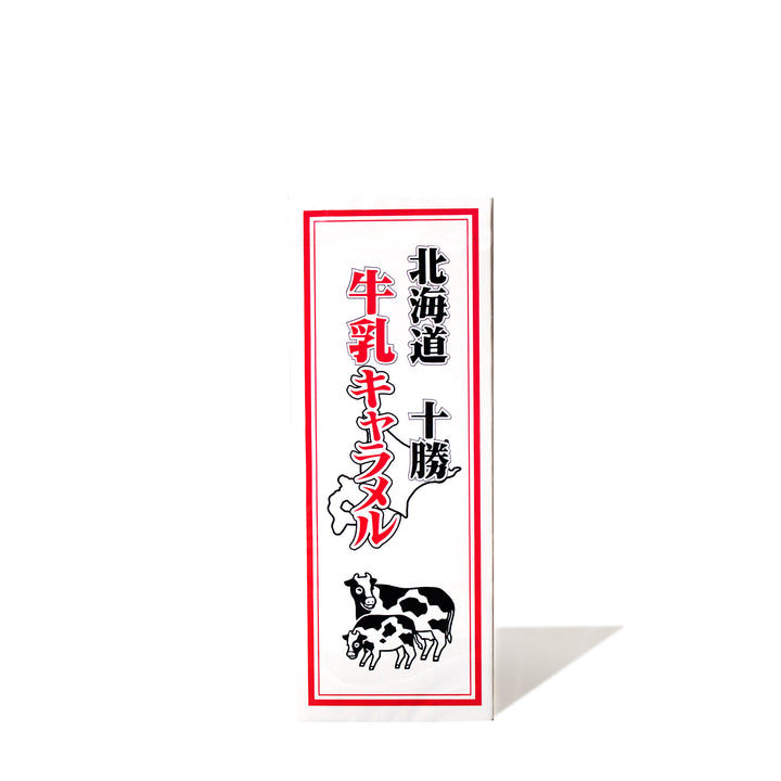 Sapporo Gourmet Foods Hokkaido Milk Caramel with Japanese writing on a white background.