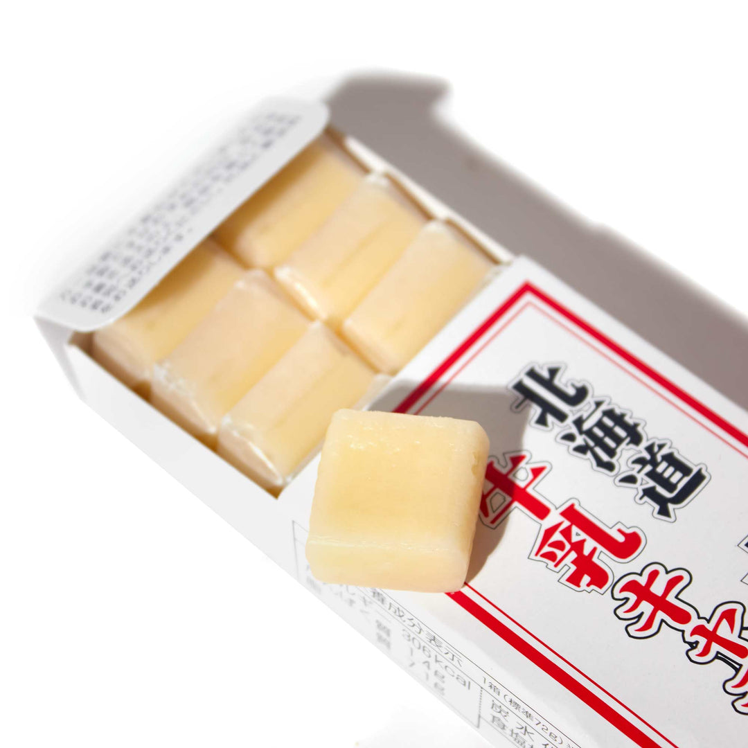 Sapporo Gourmet Foods Hokkaido Milk Caramel in a box with Chinese writing.