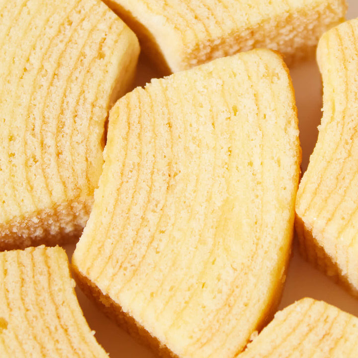 A close up of a Marukin Baumkuchen Cake: Cheese (9 Pieces).
