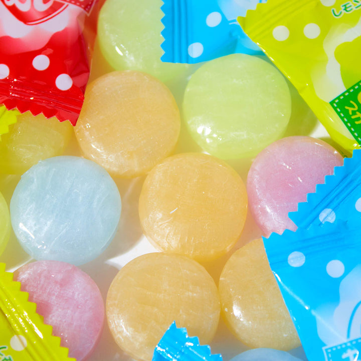 A bunch of Kawaguchi Awawa Soda Hard Candy are sitting on top of a white surface.