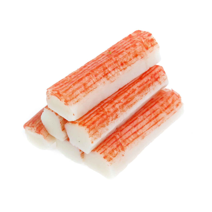 A pile of Kibun Kanikama Imitation Crab Sticks on a white background. (Brand Name: Kibun)