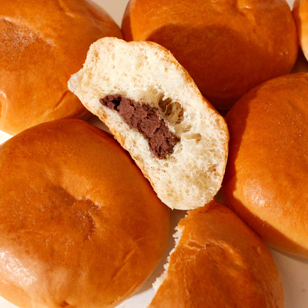 A group of Daiichi Mini Pan Bread: Chocolate (7 pieces) with a chocolate filling.