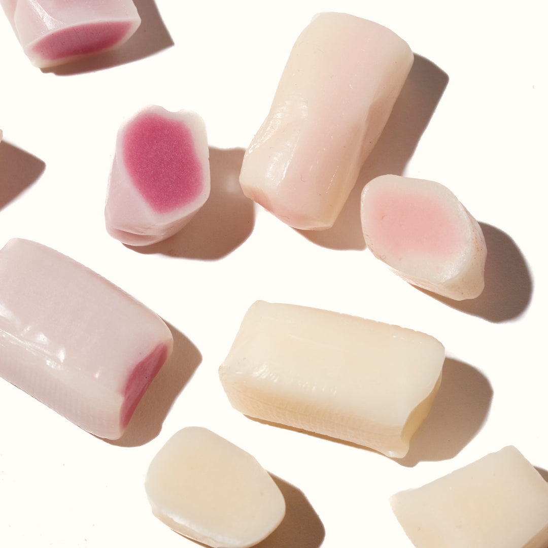A group of Morinaga Hi-Chew: Yogurt Mix candy pieces on a white surface.