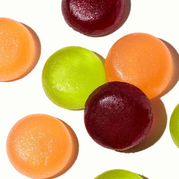 A group of Kasugai Fruits Gummy Mix: Party Size on a white surface.
