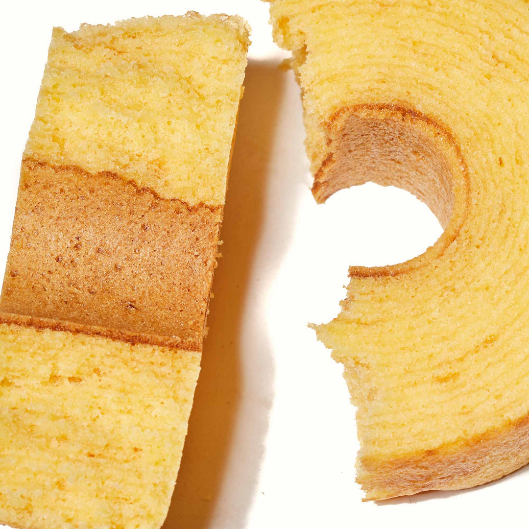 A piece of Taiyo Foods Mini Baumkuchen: Original cake is cut in half.