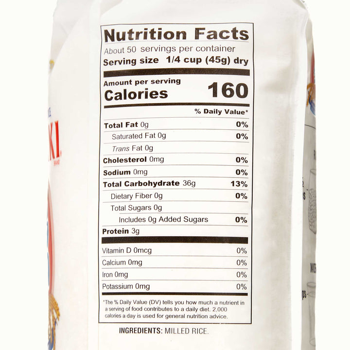 A bag of Nishiki Premium Rice: Medium Grain 5 lb on a white background.
