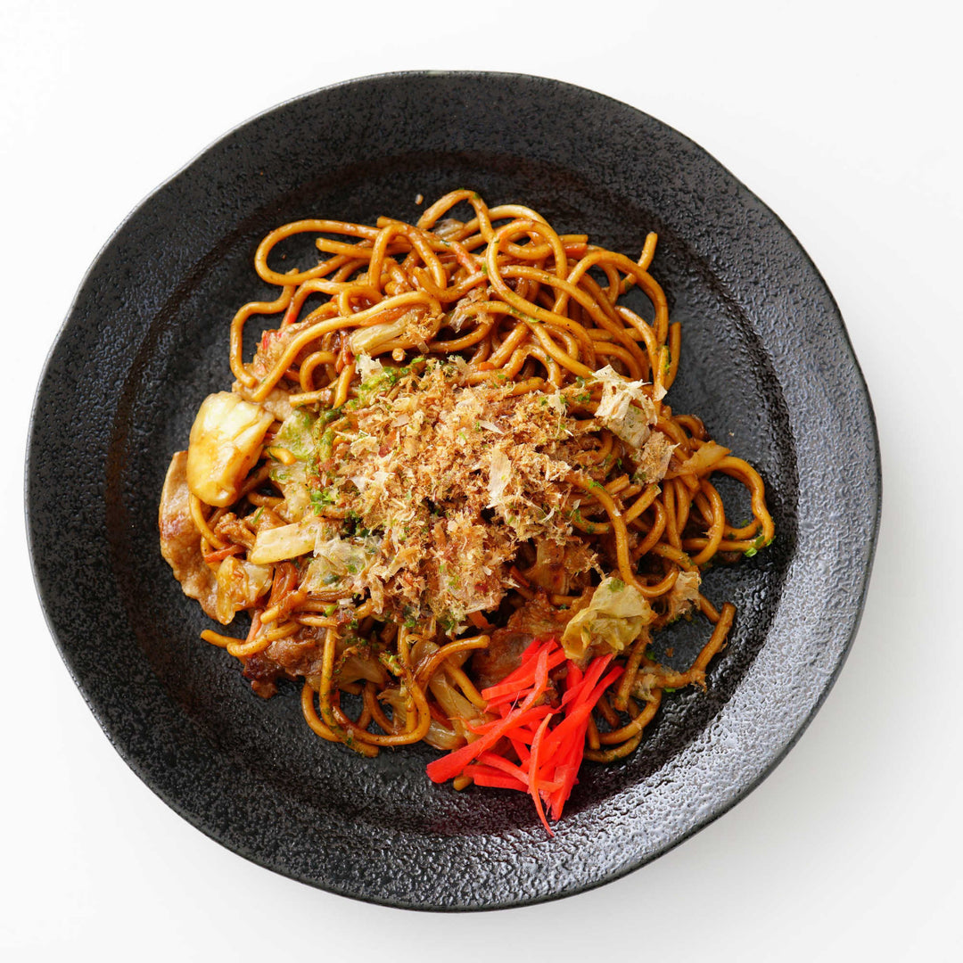A plate of Maruchan Nama Yakisoba Noodles (3 pieces) with meat and vegetables on a white background.