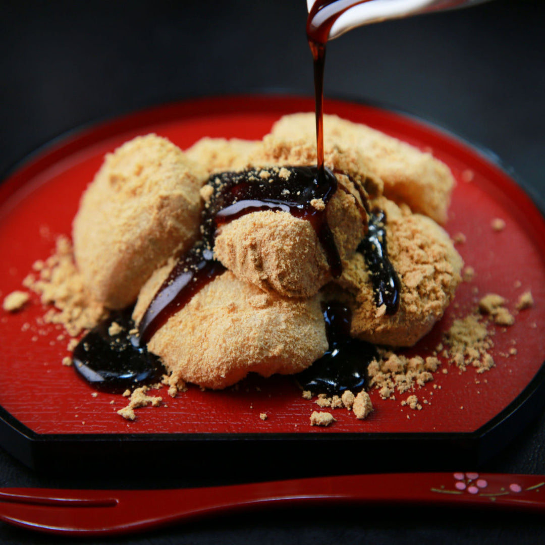 Seiki Warabi Mochi from the brand Seiki is a Japanese fried dough with a sauce being poured over it.