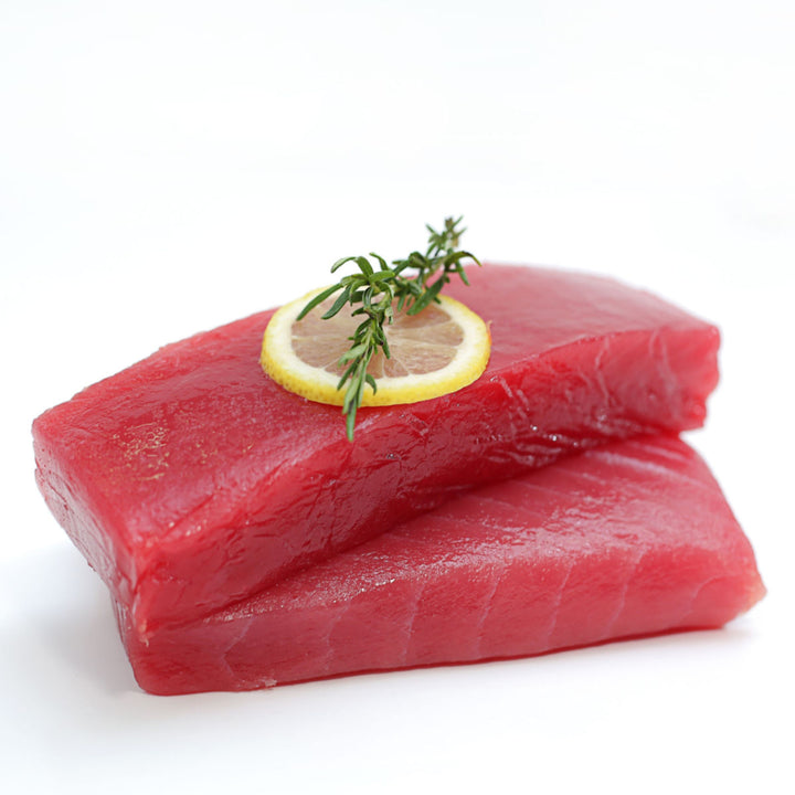 Two pieces of Sea Delight Sashimi-Grade Yellowfin Tuna (1 lb) on a white background.